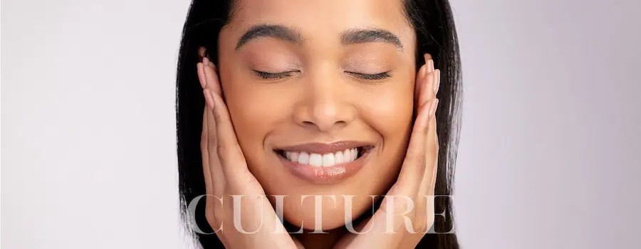 Happy girl have hands on her face | Culture Aesthetics and Wellness | Knoxville, TN